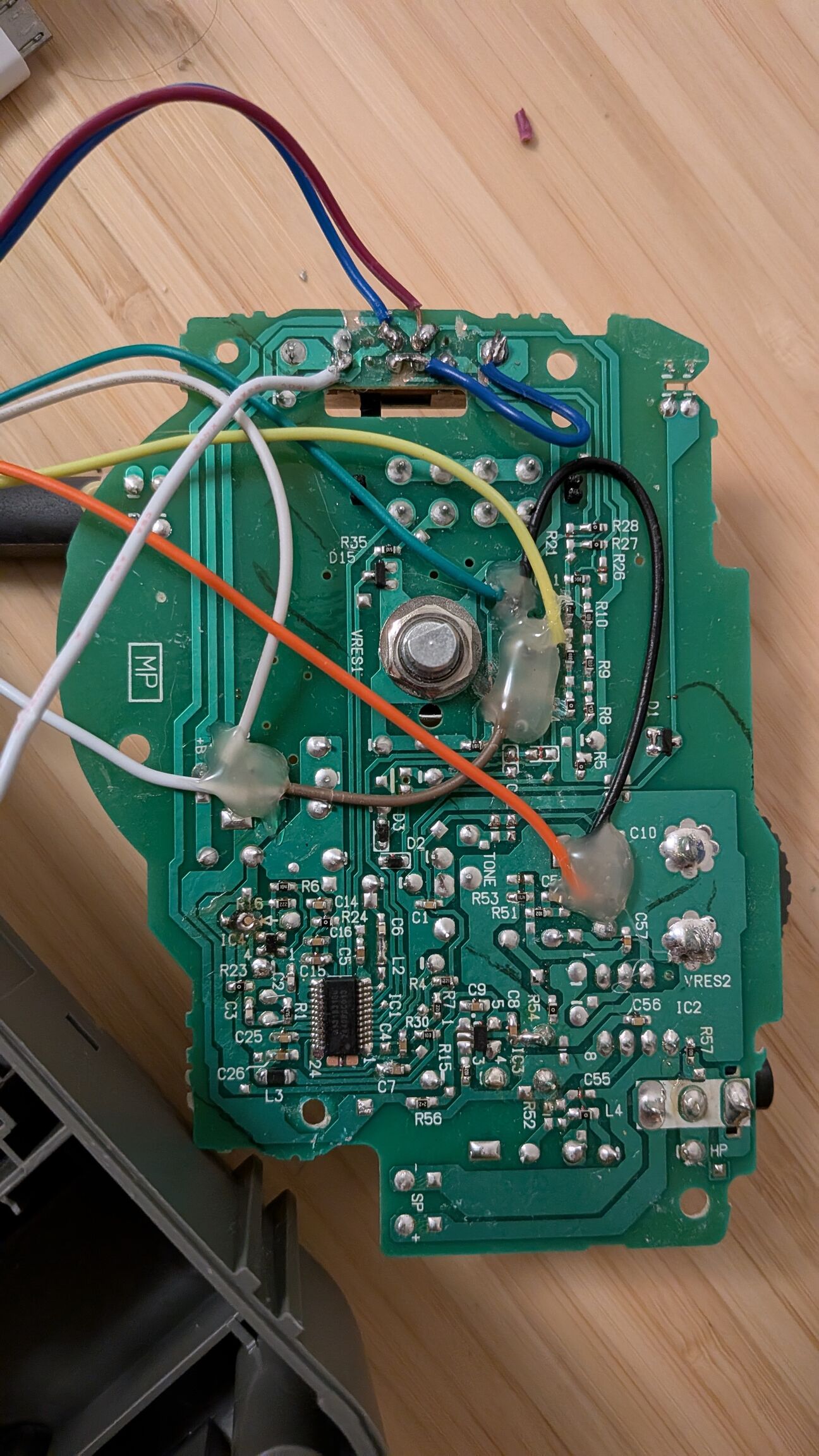 Main PCB solder side, with new jump wires soldered in